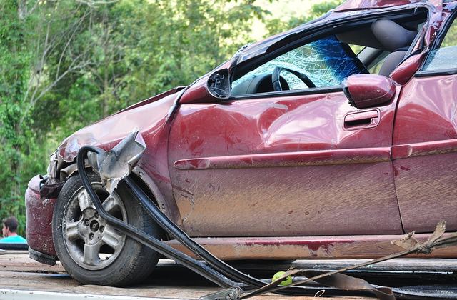 Driver documenting details after a roadway collision